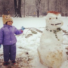 Eloise and what looks like an all-organic snowman made at the park.
